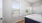 bathroom area with windows