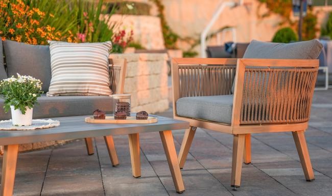 a table and chairs on outdoor patio